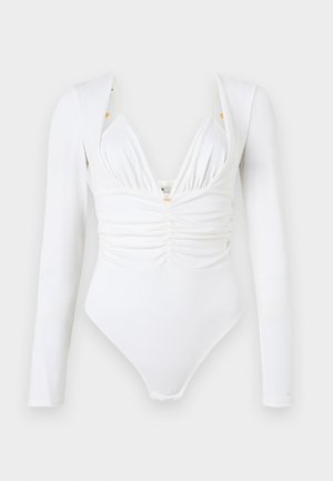 Body alb cu mânecă lungă, cu un front plisat, decolteu adânc în V și accente aurii subtile la umeri. Material neted, elastic.