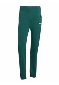 Pantalons teal à coupe fuselée, fabriqués en tissu léger. Dispose de poches latérales et d'une taille élastique pour le confort et la flexibilité.