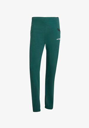 Teal broek met een tapered fit, gemaakt van lichtgewicht stof. Heeft zijzakken en een elastische tailleband voor comfort en flexibiliteit.