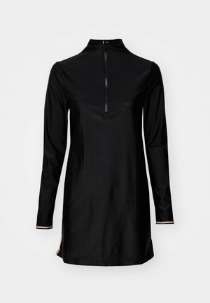 Black long-sleeve dress with a half-zip collar, made of smooth fabric. Features a small logo on the chest and striped accents on the sleeves.