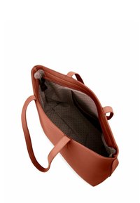 Růžová taška přes rameno s dvojitými uchy, hladkým povrchem a podšívkou s puntíky. Obsahuje hlavní zipové uzavření a vnitřní kapsy.