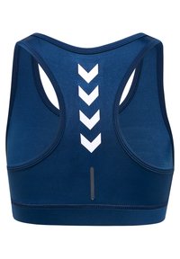 Marinblå sportbh med racerbackdesign, prydd med vita chevronmönster och reflexdetaljer på ryggen. Slät, elastisk tyg.