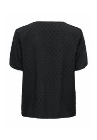 Black short-sleeve top featuring textured, raised dots on the fabric, with a loose, relaxed fit and a round neckline.