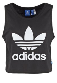 Svart kortad tanktopp i bomull med en stor vit Adidas-logotyp och tre vita ränder. Rund halsringning och ärmlös design.