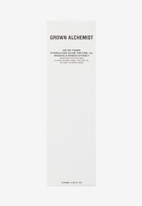 Vitt kartongförpackning för Grown Alchemist Detox Toner, med svart text. Innehåller 100 ml av produkten, med ingrediensdetaljer listade.