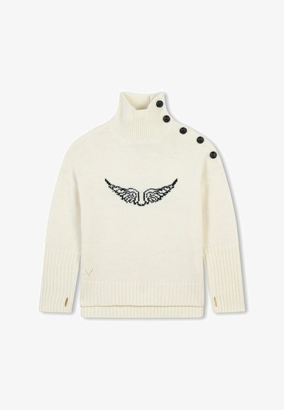 Crèmekleurige coltrui met ribbels aan de mouwen, voorzien van een zwart geborduurd vleugeldesign aan de voorkant en drie zwarte knopen op de schouder.