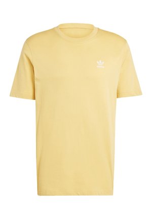 T-shirt en coton jaune avec col rond et manches courtes. Présente un petit logo Adidas blanc sur la poitrine gauche. Texture lisse.