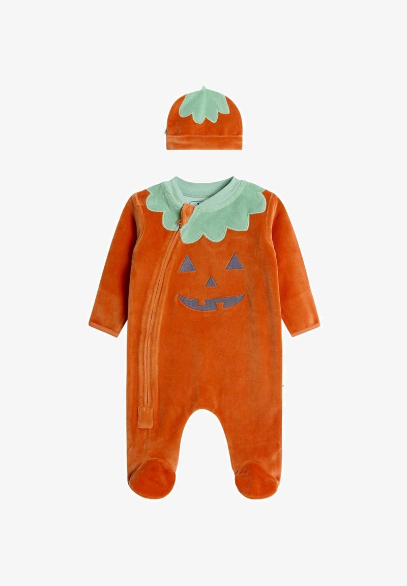 Oranžový detský overal a čiapka navrhnuté ako tekvica s golierom vo forme zeleného listu a tvárou jack-o'-lantern na hrudi.