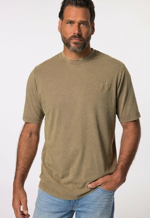 Olive green cotton t-shirt with a round neck, short sleeves, and a embossed "Yellowstone National Park" design on the chest.