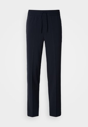 Pantalons légers bleu marine avec une taille élastique et un cordon de serrage réglable, présentant un design coupe droite et une texture lisse.