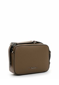 Brown textured leather crossbody bag with black accents, rectangular shape, zip closure, and silver logo detail on the front.
