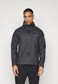 Črna lahko jakna z zadrgo, kapuco in žepom na prsih. Gladka tekstura, zračen material in logotip na prsih.