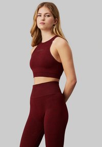 Calvin Klein Performance Reggiseno sportivo con sostegno medio - rusted root