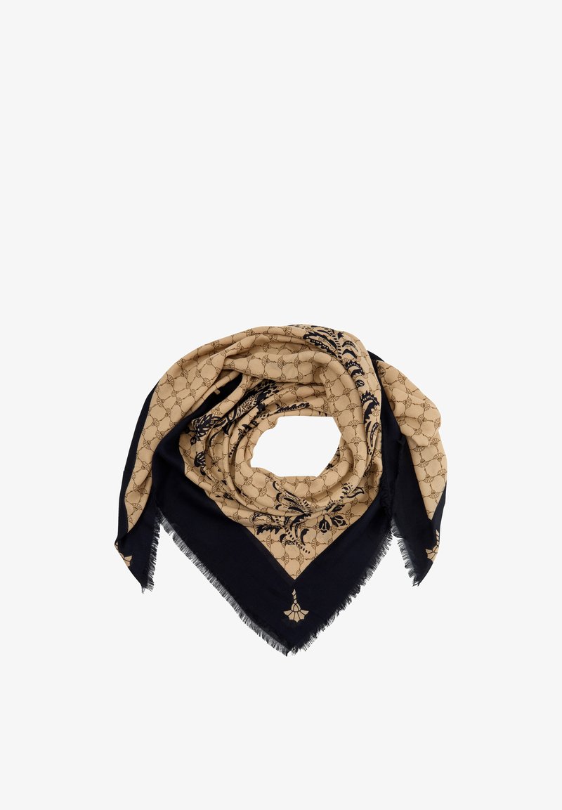 Beige und schwarzes quadratisches Halstuch mit Fransenrändern, das ein geometrisches und florales Muster zeigt, zu einer kreisförmigen Form auf weißem Hintergrund gefaltet.