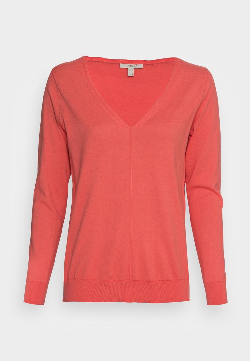 Koraalroze V-hals trui gemaakt van zacht gebreid materiaal, met lange mouwen, geribbelde manchetten en een slank, licht getailleerd ontwerp.