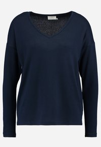 Granatowa bluzka z długim rękawem, wykonana z miękkiego materiału, z dekoltem w kształcie litery V i luźnym krojem, szerokimi rękawami oraz prostym dolnym wykończeniem.