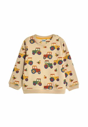Beige sweatshirt featuring a repeated pattern of colorful tractors in red, green, yellow, and blue, with a soft texture and round neckline.