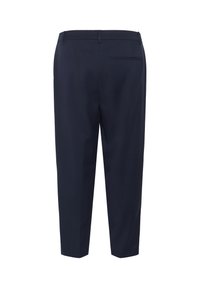 Pantalon navy à coupe ajustée, avec une texture lisse, une poche arrière unique et un design épuré et minimaliste.