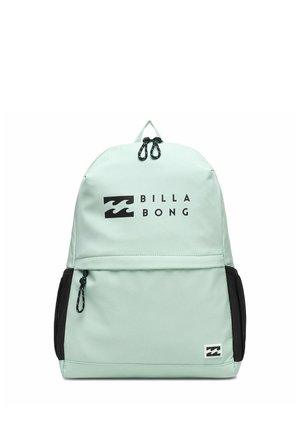 Sac à dos Billabong vert clair avec poches latérales noires, poche avant zippée et logo noir sur le panneau frontal supérieur.