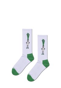 Hvite crew-sokker med grønne accenter, prydet med et tegneserie-løk-design i midten. Blødt materiale med en glat tekstur.