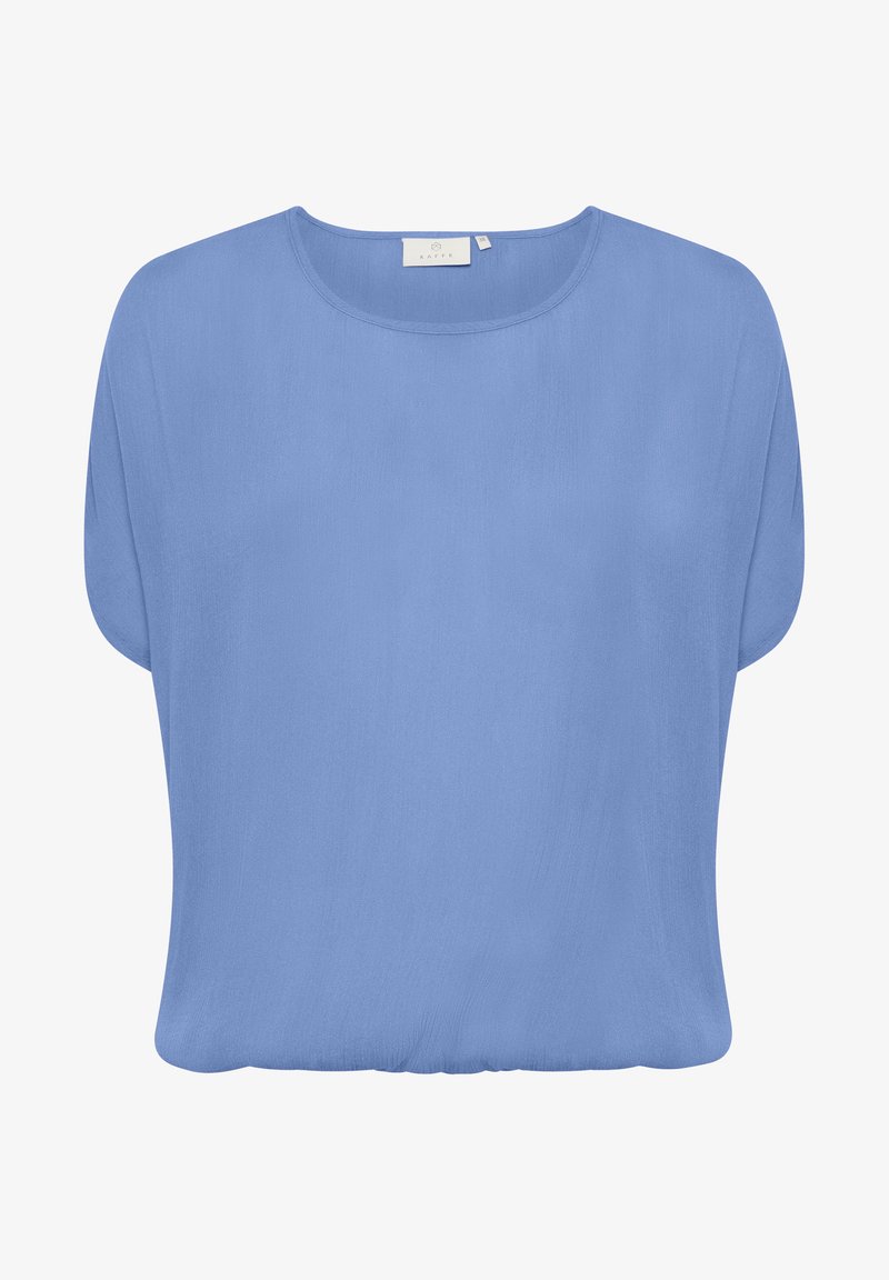 Maglietta a maniche corte, dal taglio morbido, realizzata in tessuto azzurro chiaro e liscio, con scollatura rotonda e silhouette rilassata. Senza motivi visibili o hardware.