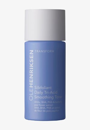 Blaue Flasche des Ole Henriksen Silkfoliant Daily Tri-Acid Smoothing Toners mit weißem Verschluss und Produkttext auf der Vorderseite.