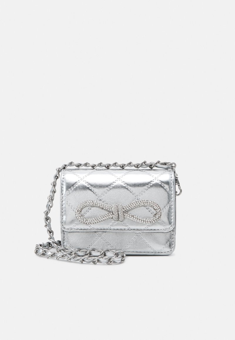 Small silver quilted handbag with chain strap and rhinestone bow detail on front flap.