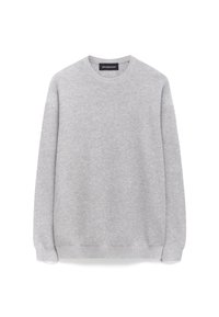 Lichtgrijze crewneck sweatshirt gemaakt van gestructureerde stof, met lange mouwen en geribbelde boorden en onderkant. Label bij de kraag.