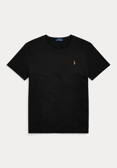Melnas kokvilnas t-krekls ar apaļu kaklu un īsām piedurknēm. Priekšā kreisajā pusē ir mazs oranžs polo logo. Gluda tekstūra.
