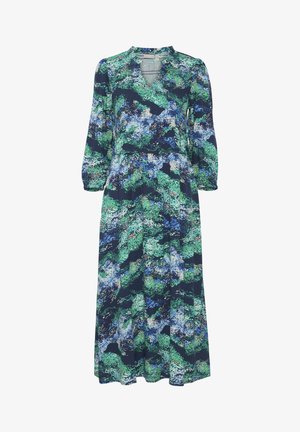 Maksikleit värvilises abstraktses mustris, kus on rohelisi, siniseid ja tumesiniseid toone. Omab V-kaelust, pikaid varrukaid ja lõdva lõiget.