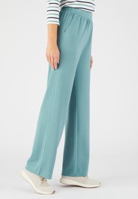 Damart JAMBES LARGES - Pantalones - vert grisé