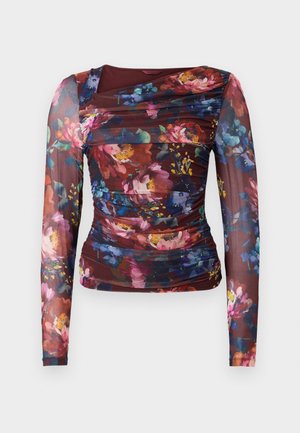 Top a maniche lunghe floreale con design arricciato in bordeaux, caratterizzato da fiori multicolori vivaci e una texture di tessuto trasparente.