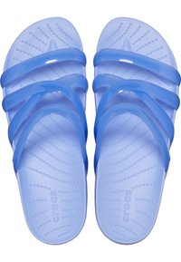 Blue slide sandals with multiple translucent straps, textured footbed, and slightly raised heel. Made of lightweight material, featuring "crocs" branding.