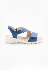 Sandalia azul con correas ajustables, plantilla acolchada suave, acentos texturizados y una suela blanca acolchada para mayor comodidad y soporte.