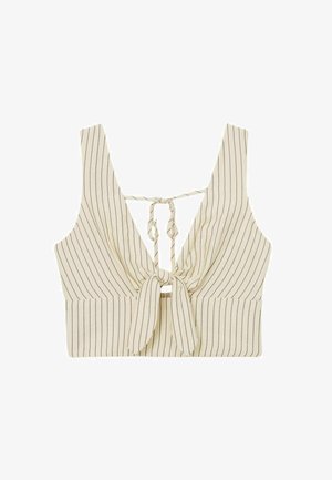 Beżowy krótki top na ramiączkach z cienkimi czarnymi pionowymi paskami, głębokim dekoltem w serek, wiązaniem z przodu oraz zapięciem z tyłu na supeł.