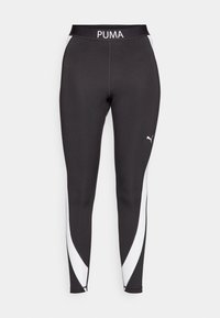 Czarne legginsy sportowe z białą boczną wstawką, z czarnym pasem w talii z logo "PUMA" oraz małym logo przy lewym kostce.