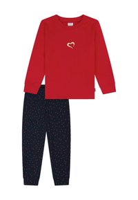 Rotes Langarmshirt mit einem goldenen Herzsymbol, kombiniert mit marineblauen Hosen, die ein Muster aus kleinen roten und weißen Formen aufweisen. Aus Baumwollmischung.