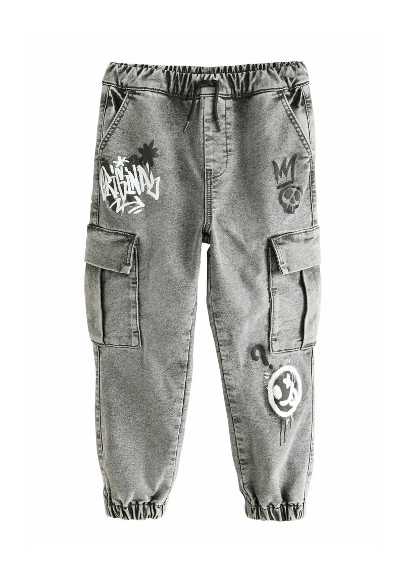 Gray cargo pants feature an elastic waistband, side pockets, and decorative graphics, including a skull and graffiti-style text.