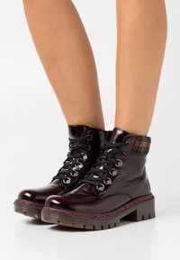 Rieker Šněrovací kotníkové boty - dark red