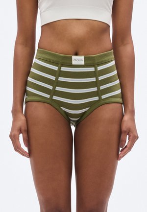 Aukštu liemeniu žaliai baltos spalvų dryžuotos moteriškos kelnaitės su reljefiniu riboto audinio dizainu ir etikete ant juosmens juostos.