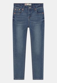 Slim taper jeans i mörkblå denim. Har kopparnitar, femficksdesign och en subtil blekt textur genomgående.