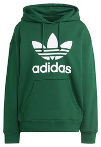 Grön hoodies gjord av mjukt material, med en framficka i känguru-stil, dragsko på huvan och en stor vit Adidas-logotyp med tre ränder.