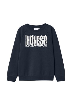 Mørkeblå sweatshirt lavet af blødt stof med raglanærmer. Har hvid tekstgrafik "HONEST" og yderligere tekst nedenunder i et rektangulært design.