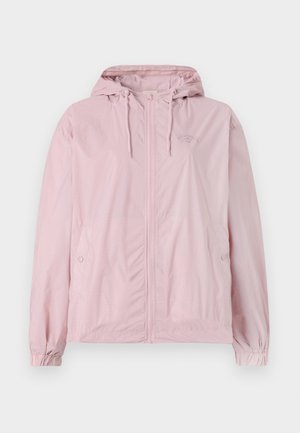 Veste coupe-vent rose pâle avec capuche, dotée d'une fermeture éclair à l'avant, de poignets élastiques et de poches latérales. Le matériau présente un léger motif à carreaux.
