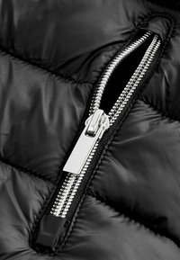 Next SHOWER RESISTANT REGULAR FIT - Vinterjacka - black