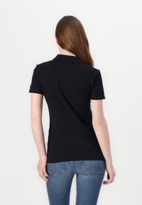 Tommy Hilfiger SLIM SCRIPT  - Polo - desert sky