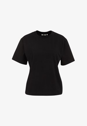 Tricou negru din bumbac, cu mâneci scurte, decolteu rotund, croială lejeră și textură netedă. Fără modele sau embellismente vizibile.