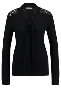 Svart stickad tröja med långa ärmar, knytning framtill och spetsdetaljer på axlarna. Mjuk textur, figurnära design.