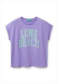 Purple t-shirt with short sleeves, featuring "LONG BEACH" in mint green bold text across the front and a round neckline. Soft fabric texture.