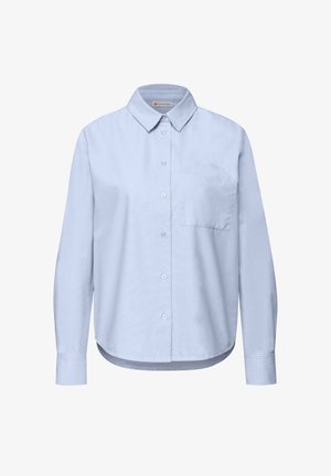 Světle modrá košile s dlouhým rukávem z bavlny, s límečkem, přední kapsou a rovný lem s knoflíkovými detaily.